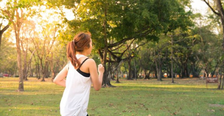 Parks - Woman About to Run during Golden Hour